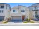 Contemporary two-story home showcasing clean lines, neutral colors, and well-manicured landscaping at 10434 Rose Palisade St, Las Vegas, NV 89141