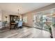 Elegant dining area with stylish furniture, chandelier, and access to an outdoor patio at 10809 Garden Mist Dr # 1042, Las Vegas, NV 89135