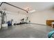 Spacious three car garage featuring an epoxy floor and lots of open space at 10809 Garden Mist Dr # 1042, Las Vegas, NV 89135
