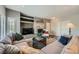 Comfortable living room with stone fireplace, plush seating, and stylish decor at 10809 Garden Mist Dr # 1042, Las Vegas, NV 89135