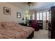 Cozy bedroom featuring a comfortable bed, soft lighting and stylish decor at 10949 Fintry Hills St, Las Vegas, NV 89141