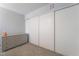 Bedroom features a large closet and a gray dresser, perfect for storage and organization at 1407 Dorothy Ave # 2, Las Vegas, NV 89119