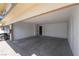 Spacious carport with concrete flooring and access doors on the side and back at 1407 Dorothy Ave # 2, Las Vegas, NV 89119