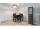 Cozy dining area featuring modern lighting and a comfortable table with seating for four at 1407 Dorothy Ave # 2, Las Vegas, NV 89119