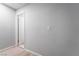 Hallway with light wood laminate flooring and neutral colored walls at 1407 Dorothy Ave # 2, Las Vegas, NV 89119