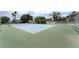 Outdoor tennis court with a green and blue surface, surrounded by a fence at 1407 Dorothy Ave # 2, Las Vegas, NV 89119