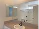 Bathroom features large mirrors, vanity, and shower and tub combination at 1441 Bronco Rd, Boulder City, NV 89005