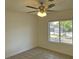 Bedroom with ceiling fan, carpet, and view of the exterior at 1441 Bronco Rd, Boulder City, NV 89005