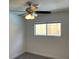 This bedroom features a standard window and ceiling fan at 1441 Bronco Rd, Boulder City, NV 89005
