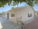 Exterior of the house with the pool equipment and windows at 1441 Bronco Rd, Boulder City, NV 89005