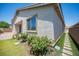 Charming home backyard with brick pavers, grass and well maintained yard landscaping at 1617 Meadow Bluffs Ave, Henderson, NV 89014