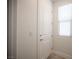 Bright entryway featuring a paneled door, window, and neutral wall color offering a welcoming entrance at 1617 Meadow Bluffs Ave, Henderson, NV 89014