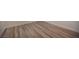 Highlighted wood-look flooring provides a modern and stylish aesthetic to the room at 1617 Meadow Bluffs Ave, Henderson, NV 89014