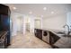 Kitchen island with stainless appliances, granite counters, view of pantry at 1617 Meadow Bluffs Ave, Henderson, NV 89014