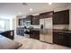 Spacious kitchen features granite countertops, stainless steel appliances, and ample cabinet space at 1617 Meadow Bluffs Ave, Henderson, NV 89014