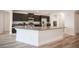 A beautifully appointed kitchen with stainless appliances and a convenient breakfast bar at 1617 Meadow Bluffs Ave, Henderson, NV 89014