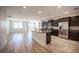 Bright, open kitchen featuring stainless steel appliances, granite countertops, and an island at 1617 Meadow Bluffs Ave, Henderson, NV 89014
