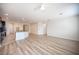 Open living space featuring wood-style floors and seamless access to the kitchen at 1617 Meadow Bluffs Ave, Henderson, NV 89014