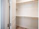 This large walk-in closet features ample storage with rods and shelving at 1617 Meadow Bluffs Ave, Henderson, NV 89014