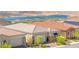 Aerial shot showcasing a modern home with lake views at 163 Caraset Ln, Henderson, NV 89011