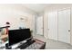Bedroom features a work desk, a closet with sliding doors, and carpet at 163 Caraset Ln, Henderson, NV 89011