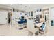 Open dining area to the kitchen, bright space and tile flooring at 163 Caraset Ln, Henderson, NV 89011