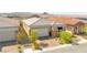 Stunning aerial view of a single-Gathering home with tile roof and stone accents at 163 Caraset Ln, Henderson, NV 89011