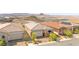Beautiful home exterior with desert landscaping and a two-car garage at 163 Caraset Ln, Henderson, NV 89011