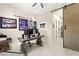 Office with hardwood floors, fan, decor, desk and sliding barn door at 163 Caraset Ln, Henderson, NV 89011