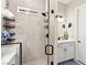 Elegant shower boasting designer tile, modern fixtures, and a glass door entry at 163 Caraset Ln, Henderson, NV 89011