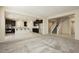 Spacious living room with an open floor plan and kitchen access at 1633 Dornie Ave, North Las Vegas, NV 89084