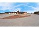 This home features a desert landscape, solar panels, ample parking, and is a single story at 1800 Red Rock Dr, Pahrump, NV 89048