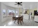 Eat-in kitchen featuring a breakfast nook with a dining table and white cabinetry at 1800 Red Rock Dr, Pahrump, NV 89048