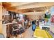 Interior of the shed showing storage space, plywood walls, and exposed rafters at 1800 Red Rock Dr, Pahrump, NV 89048
