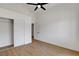 A bright bedroom with hard surface floors, ceiling fan, and large closet with easy access to all rooms at 2050 N Los Feliz St # 171, Las Vegas, NV 89156