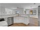 A bright modern kitchen with stainless steel appliances, marble countertops, and a view to the outside at 2050 N Los Feliz St # 171, Las Vegas, NV 89156