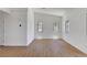 Inviting living room featuring wood-look floors, bright windows, and a comfortable, airy atmosphere at 2050 N Los Feliz St # 171, Las Vegas, NV 89156