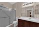 Bathroom featuring a shower and a single sink vanity with bright lighting and tile floors at 2291 W Horizon Ridge Pkwy # 6131, Henderson, NV 89052