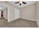 Bedroom featuring neutral walls, carpet flooring, a ceiling fan, and a closet at 2291 W Horizon Ridge Pkwy # 6131, Henderson, NV 89052