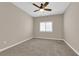 Bedroom showcasing neutral walls, carpeted floors, and a bright shuttered window at 2291 W Horizon Ridge Pkwy # 6131, Henderson, NV 89052