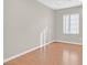 Neutral bedroom with hardwood floors and natural light at 2428 Hamonah Dr, Henderson, NV 89044