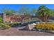 Solera at Stallion Mountain community entrance with desert landscaping and a decorative rock feature at 2428 Hamonah Dr, Henderson, NV 89044