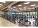 Well-equipped gym featuring modern exercise equipment and abundant natural light from many windows at 2428 Hamonah Dr, Henderson, NV 89044