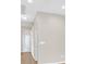 Bright hallway with neutral walls and hardwood floors at 2428 Hamonah Dr, Henderson, NV 89044
