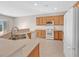 Spacious kitchen featuring a breakfast bar, stainless steel sink, and ample counter space at 2428 Hamonah Dr, Henderson, NV 89044