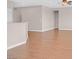 Open-concept living area with wood floors and neutral tones, perfect for entertaining at 2428 Hamonah Dr, Henderson, NV 89044