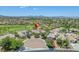 Drone image highlighting the property's prime location within a lush golf course community at 2997 Via Meridiana, Henderson, NV 89052