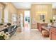 Elegant bathroom with a clawfoot tub, glass shower, and bright natural light at 2997 Via Meridiana, Henderson, NV 89052