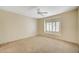 Spacious bedroom with neutral paint, carpet flooring, and a large window with shutter blinds at 3025 Seaford Peak Dr, Henderson, NV 89052