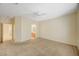 Large bedroom features neutral walls, carpet flooring, and an ensuite bathroom at 3025 Seaford Peak Dr, Henderson, NV 89052